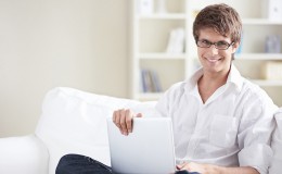 A young man with laptop